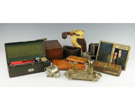 A green leatherette 'Sealing Set' box with contents, 21cm wide, two burr walnut cigarette cases with tinder cord, one stone s