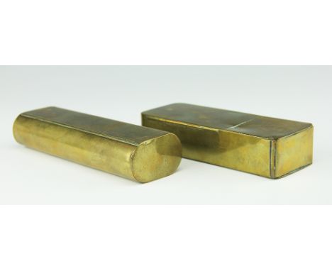 A 19th century brass smokers box, with hinged lid enclosing tobacco box, internal pipe holder and vesta case, 14cm long and a