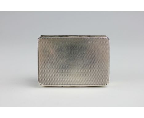 A silver vesta case, Sampson Mordan, London 1930, with engine turned cover and two striker slots below, gilt interior, 'Paten