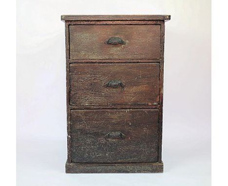 A Victorian scumbled pine pillar chest, of three drawers, with cusped handles, 87cm H x 58cm W x 49cm D