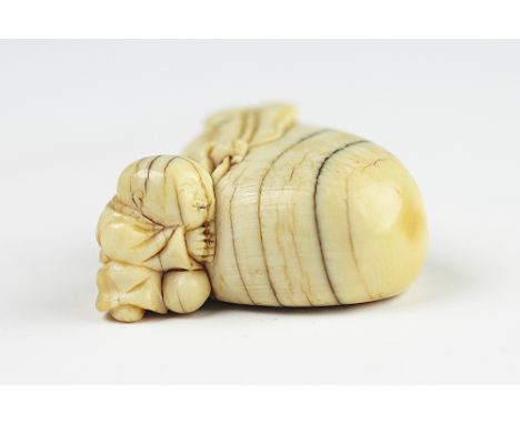 A 19th century Japanese carved ivory netsuke, Edo period, Karako with treasure bag, unsigned, 4.25cmPlease note: Trevanion & 