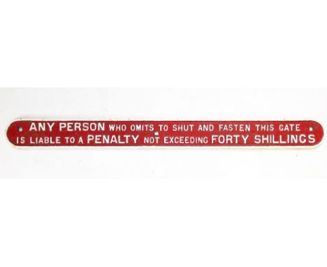 A vintage cast iron Railway sign, 'Any person who omits to shut and fasten this gate is liable to a penalty not exceeding for