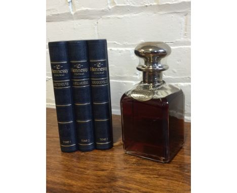 COGNAC - a bottle of Hennessy Cognac 'Library Edition' housed in presentation case, c1970s. Seal on the decanter remains inta