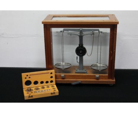 PHILIP HARRIS SCIENTIFIC SCALES - a set of Philip Harris Ltd scientific / apothecary / laboratory scales inside a glazed wood