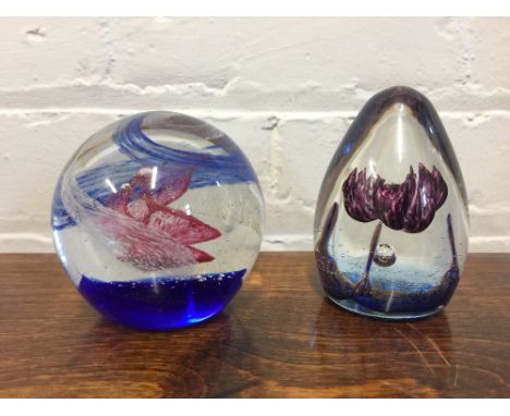 CAITHNESS PAPERWEIGHT - a Caithness Cinnabar paperweight designed in 1998 by Philip Chaplain with a second unmarked glass pap