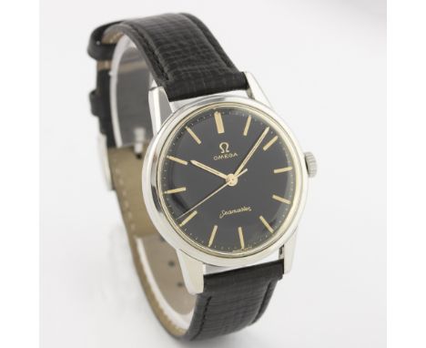 OMEGA SEAMASTER - an attractive black dial Omega Seamaster dating from c1962 (Ref: 14390-62-SC). Black dial with gold baton m