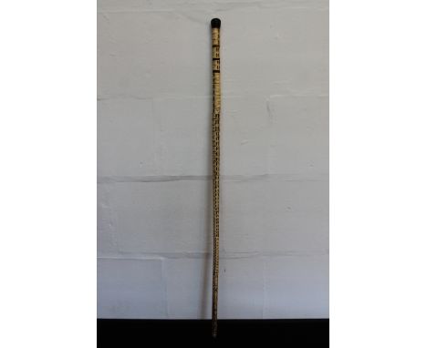 SHARK SPINE WALKING STICK - a walking stick formed from shark vertebrae, 91cm in length.