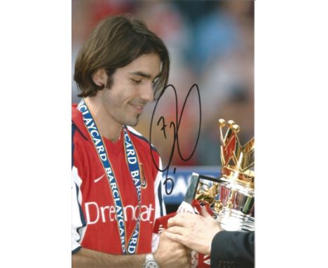 Robert Pires signed 12x8 colour photo in Arsenal kit. Good condition Est.