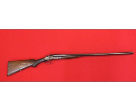 A 12 bore side-by-side hammer shotgun with 30" barrels by Rosson of Norwich, this item can only be purchased by someone with 