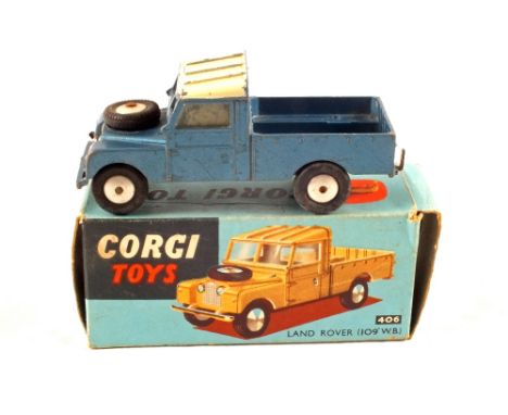 A boxed Corgi, 406 Land Rover with blue body (one missing box flap)