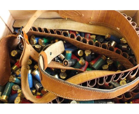 A good quantity of various 12 bore cartridges with cartridge belts and a quantity of auction catalogues, this item can only b