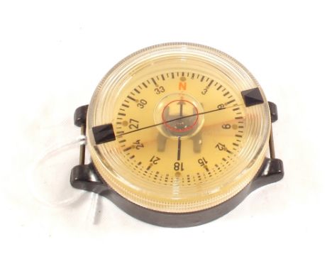 A WWII German Luftwaffe wrist compass marked AK 39 F123235-1 S/No. 3828660