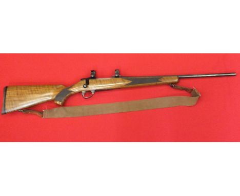 A Sako AII bolt action rifle .243 calibre, S/No.819075, this rifle is in 'as new' condition complete with sling and Sako scop