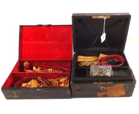A Wiltshire Regiment officers belt, sash and shoulder insignia etc with cap badge and collar badges, all within two boxes