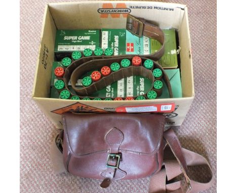 Approx two hundred and fifty 12 bore cartridges with a leather cartridge belt and bag, this item can only be purchased by som