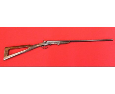 A .410 S/S shotgun with a cut-a-way stock and in very good condition overall for this model, S/No. 1253, this item can only b
