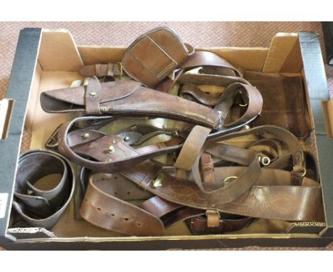A tray of Officers Sam Browne leather equipment including a holster and ammunition pouch