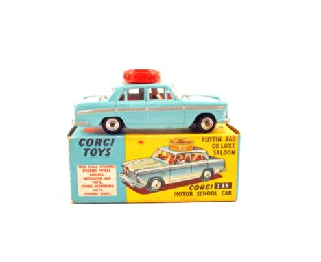 A boxed Corgi, 236 motor school car