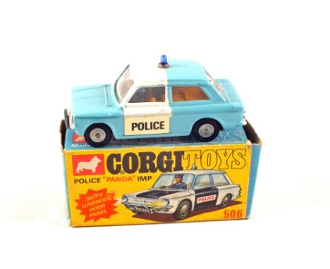 A boxed Corgi, 506 Police Panda Imp with blue body