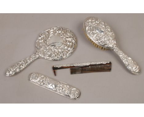 A part silver backed brush and comb set, assayed Birmingham 1963.