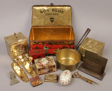 A collection of metalwares, brass tea caddy, wall sconces, iron and brass pan, along with a oriental decorated tin Horner boy