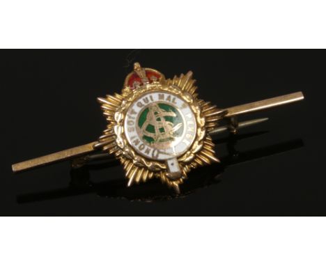 A 9ct gold Army service corps bar brooch.