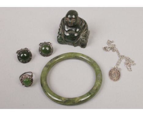 A Chinese sterling silver pendant on chain and various Eastern Nephrite collectables including carved Buddha, bangle, pair of