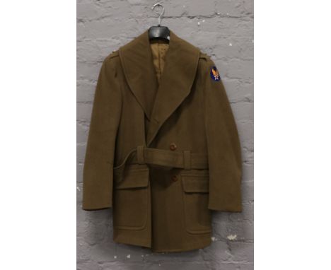 A World War II original 1941 US Army Khaki wool overcoat with belt label reads, Albert Turner Inc dated Oct 13 1941 size 38 R