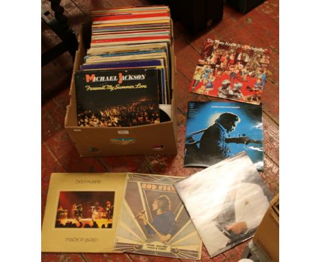 A box of LP records including Deep Purple. Michael Jackson, 10cc and easy listening.
