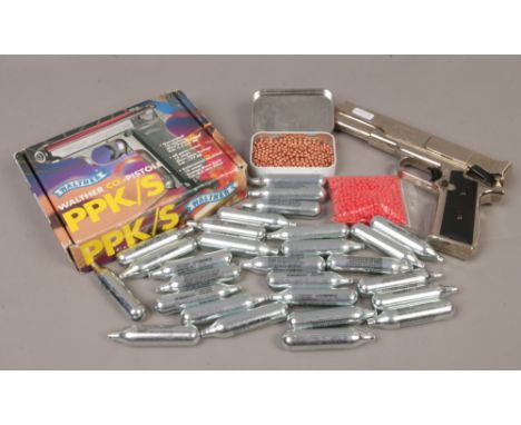 A boxed reproduction Walther Co2 Pistoley BB gun, along with a G10 repeater pistol and bag of 28 Umbrex Co2 cylinders and amm