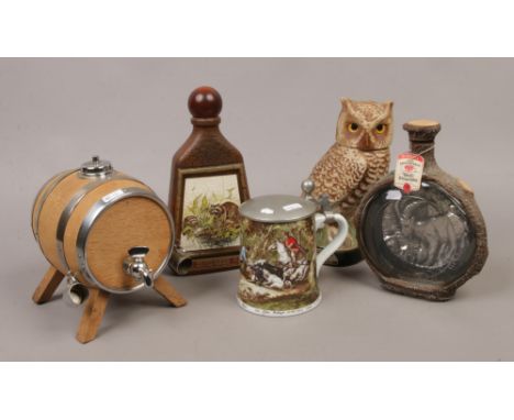 A collection of breweriana to include Beam Kentucky bourbon decanter formed as an owl, oak Sherry cask, hunting tankard etc.