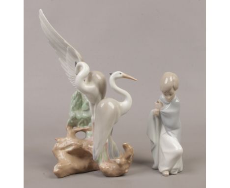 A Nao figure group of herons, along with a Lladro figure of a young Saint Joseph (missing staff).