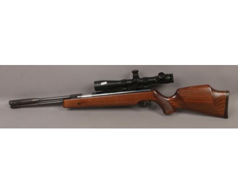 A Weihrauch HW 97 K .22 calibre under lever air rifle fitted with a Leupold mark 4 35-10 x 40 M3 scope.