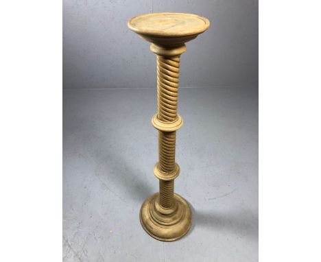 Tall light wood turned plant stand on circular base, approx 100cm tall