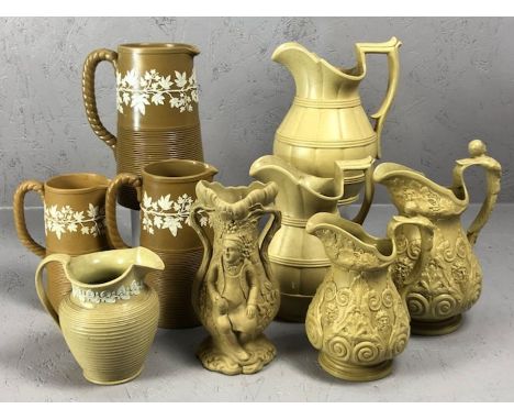Good collection of nine ceramic jugs and vases to include parianware examples, possibly Davenport, Ridgway etc