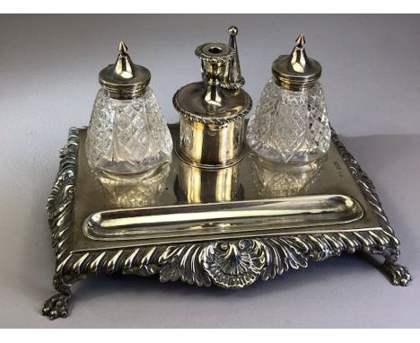 Silver Birmingham Hallmarked Inkwell stand with candle holder and snuffer, two glass silver topped inkwells on silver stand o