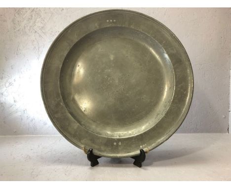 Interesting large pewter charger having hallmarks, four of (shield with RP, shield with possibly a harp, also stamped with th