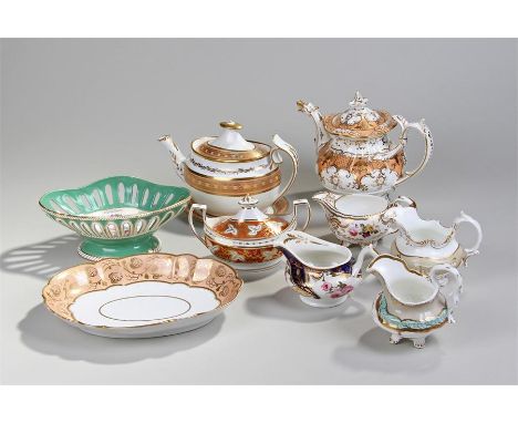 Victorian teapot, decorated with gilt sprigs and orange, together with another tea pot with stand, four porcelain jugs, a ser