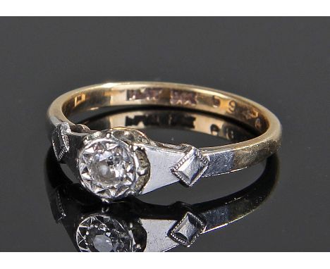 9 carat gold and diamond ring, the central diamond mounted in platinum with angled shoulders, ring size M