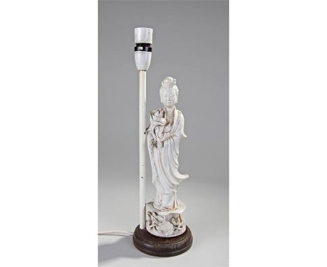 Blanc de Chine Chinese figure, depicting Guanyin,mounted on a lamp base, the figure 31cm high