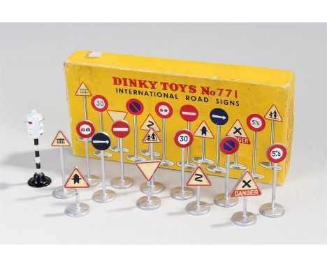 Dinky Toys, 771 International road signs comprising of 12 assorted signs, in the original lift-off lid box, together with an 