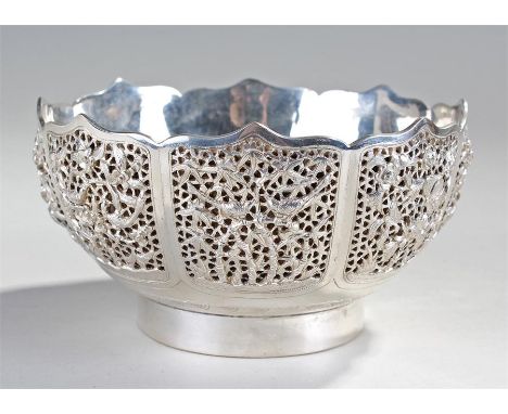 Chinese silver plated bowl, the shaped top lip above blind fret foliate panels, with butterfly's and birds, double layered, C