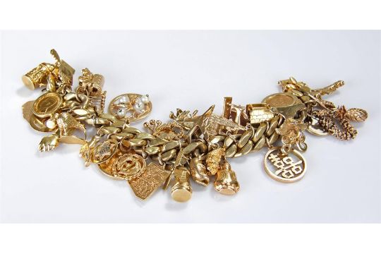 Heavy Gold Charm Bracelet The 18 Carat Chain With A Mix Of 9 Next