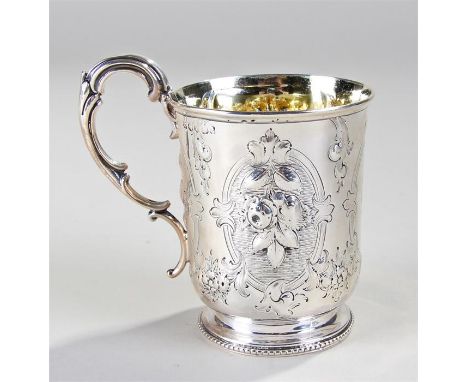 Victoria silver mug, Sheffield 1863, maker Henry Wilkinson & Co, the embossed mug with swags and fruit, engraved to the front