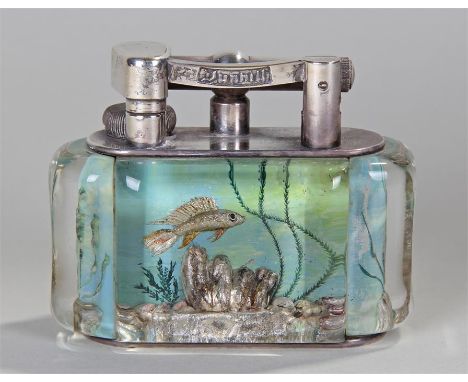 Circa 1950's Alfred Dunhill Aquarium table lighter, the Perspex body of rounded rectangular form, silvered fittings, one side