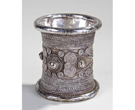 Indian white metal bangle, circular form with applied circular designs, rows of boarder line decoration, 8.5cm high, 8cm wide
