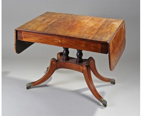 Regency rosewood and satinwood banded sofa table, the rectangular top with drop down ends, with a pair frieze drawer above a 