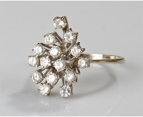 18 carat white gold and diamond set ring, the fifteen brilliant cut diamonds raised on branches, ring size U