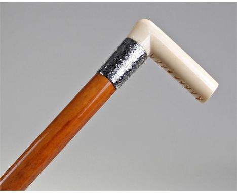 Victorian ivory, silver and malacca walking stick, with smooth ivory handle above an inscribed silver collar and malacca cane