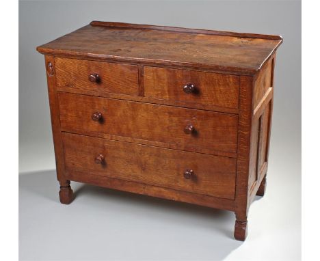 1930's Robert ``Mouseman`` Thompson oak chest of drawers, with gallery back, the overhanging top, above two short and two lon